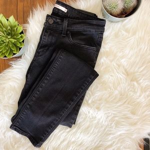 Levi's Black Mid Rise Ripped Skinny Jeans